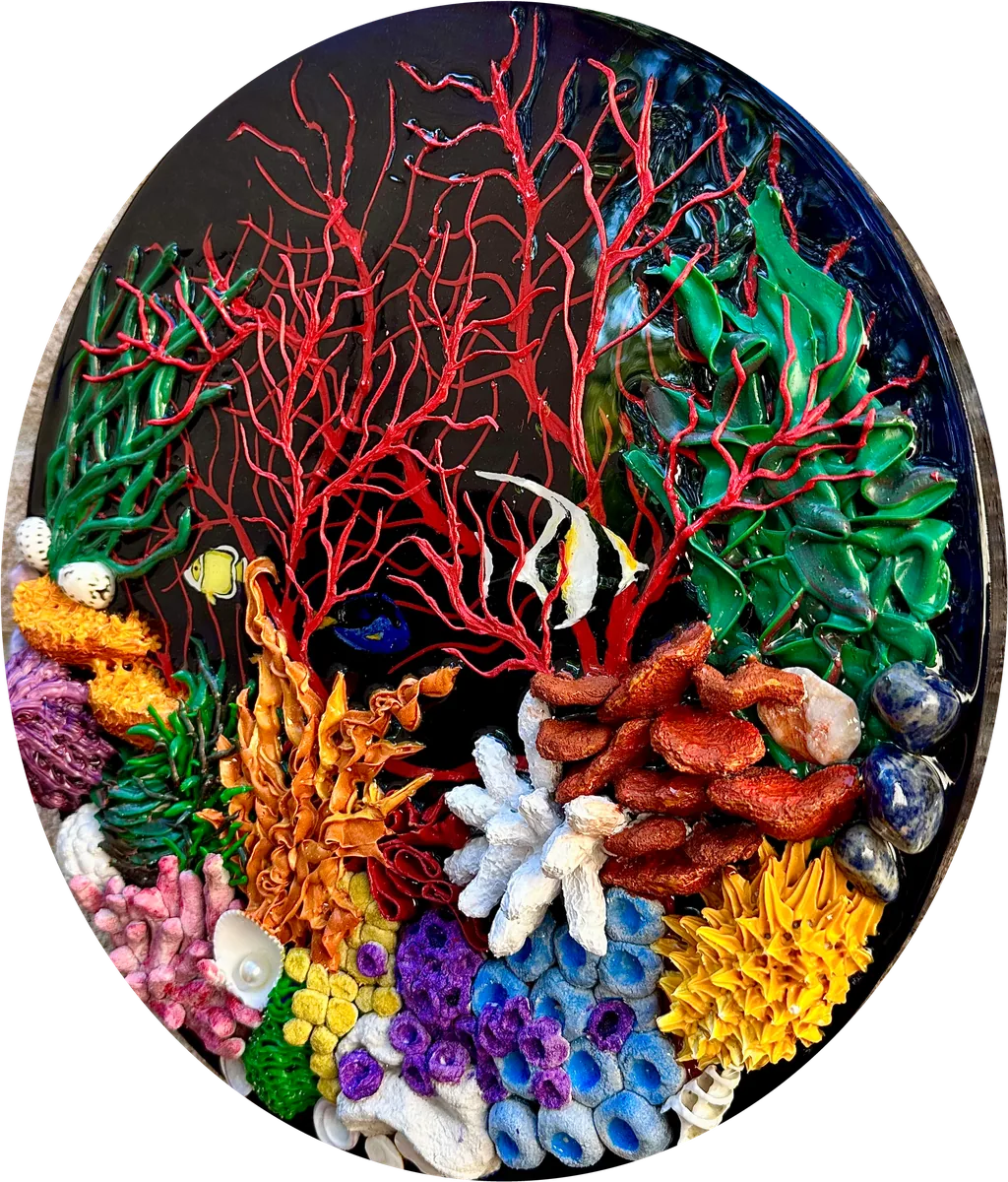 Round panel with a sculpted coral reef in red, orange, blue and white
